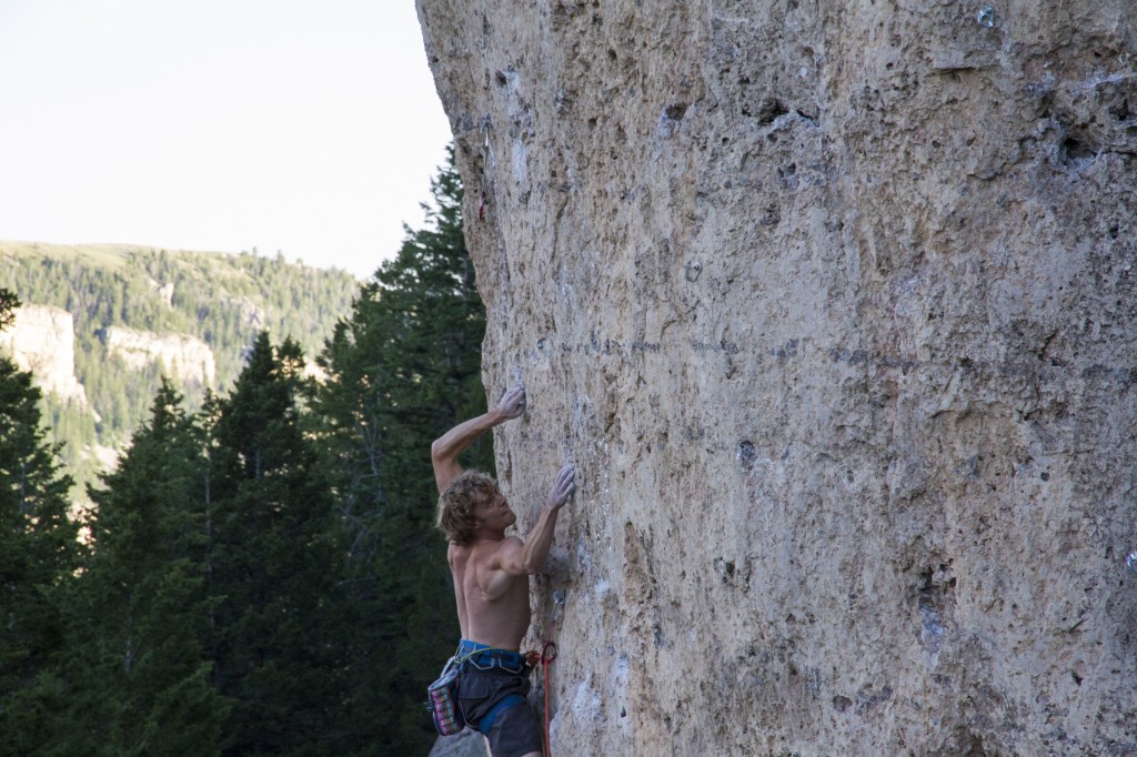 Trying hard on a trick spot. Happiness in Slavery (5.12b).